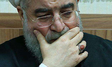 لرزش دست و استرس روحانی در حین مناظره