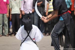 سربریدن و به صلیب کشیدن نتیجه پیوند داعش و سعودی+تصاویر